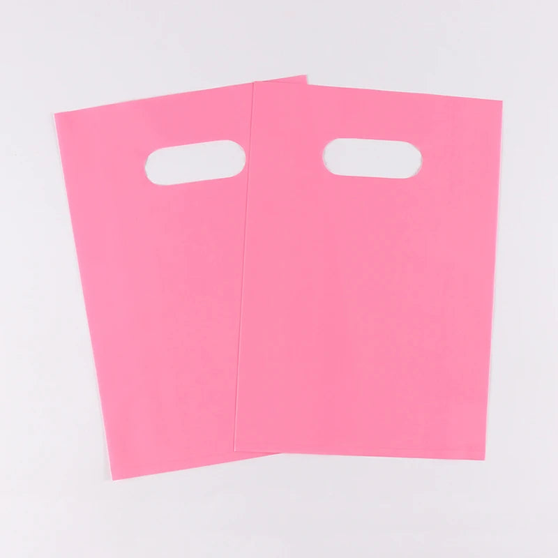 100PCS/PACK D2W Bio Degradable Die Cut Plastic Packaging With Handle Reusable Small Glossy Pink Flat Merchandise Tote Bags