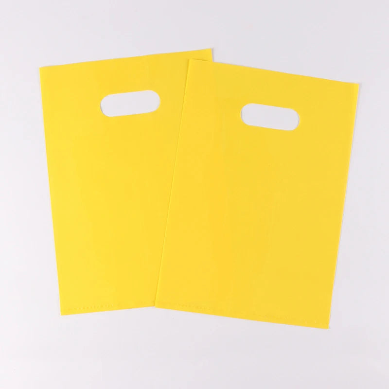 100PCS/PACK D2W Bio Degradable Die Cut Plastic Packaging With Handle Reusable Small Glossy Pink Flat Merchandise Tote Bags